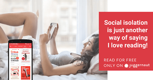 A woman laying on a bed reading a book on her tablet